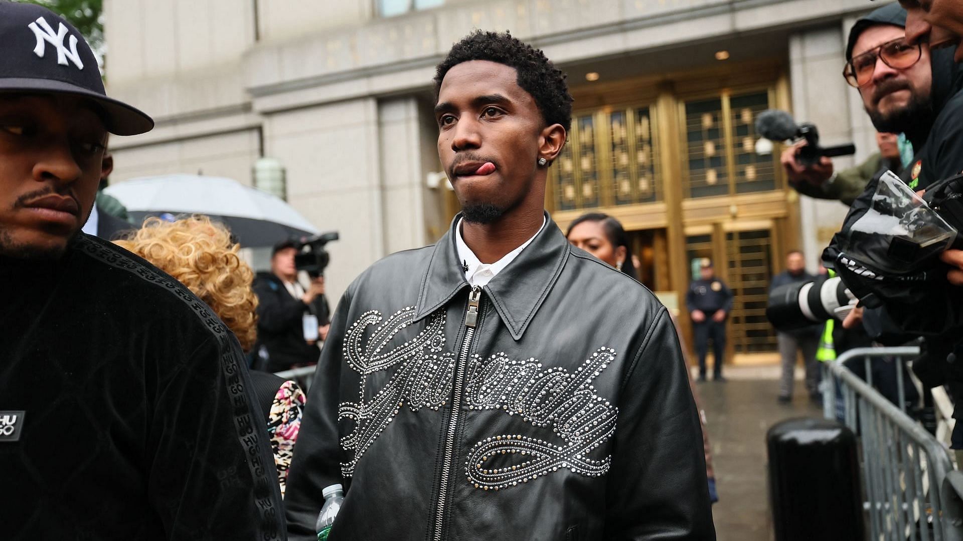 King Combs, son of Sean "Diddy" Combs, leaves for the day during Combs' trial at Manhattan Federal Court on May 13, 2025, in New York City. (Image via Getty/Michael M. Santiago)